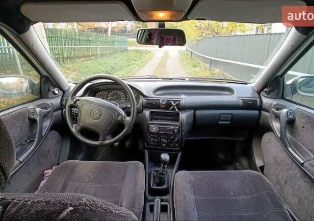 Білий Опель Астра, об'ємом двигуна 1.6 л та пробігом 296 тис. км за 1300 $, фото 11 на Automoto.ua