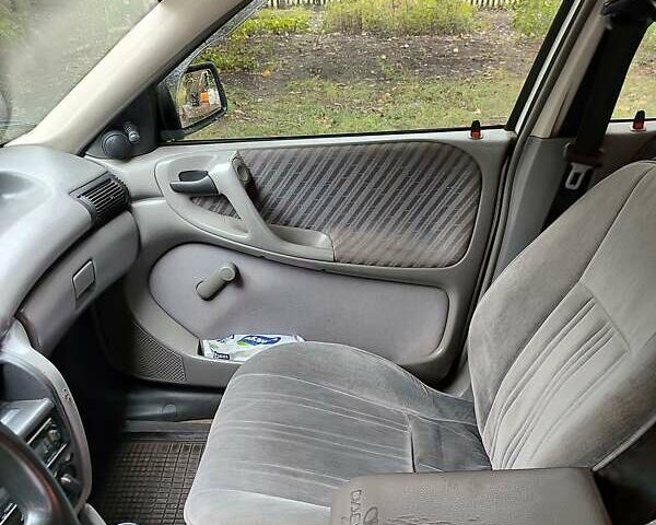 Белый Опель Астра, объемом двигателя 1.4 л и пробегом 312 тыс. км за 1100 $, фото 15 на Automoto.ua