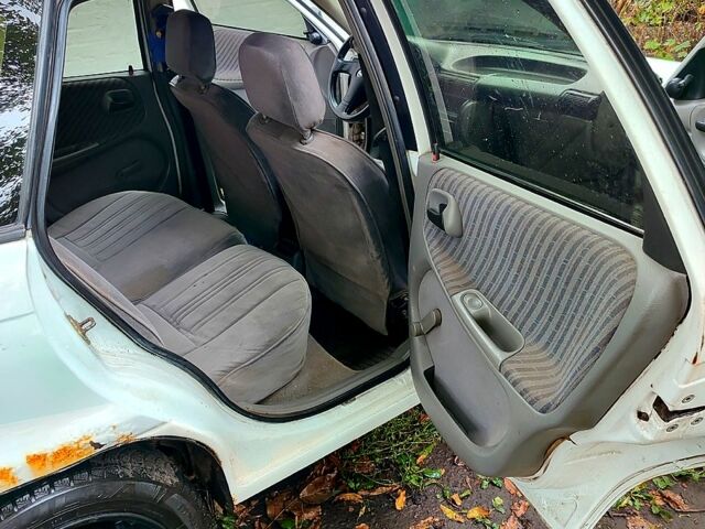 Белый Опель Астра, объемом двигателя 1.4 л и пробегом 312 тыс. км за 1100 $, фото 6 на Automoto.ua