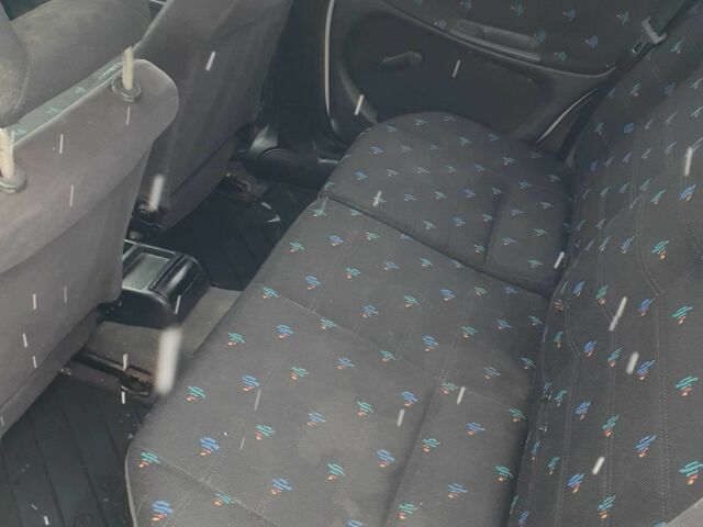 Белый Опель Астра, объемом двигателя 1.4 л и пробегом 320 тыс. км за 1499 $, фото 8 на Automoto.ua