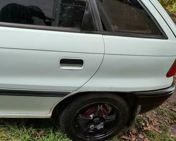 Белый Опель Астра, объемом двигателя 1.4 л и пробегом 312 тыс. км за 1100 $, фото 24 на Automoto.ua