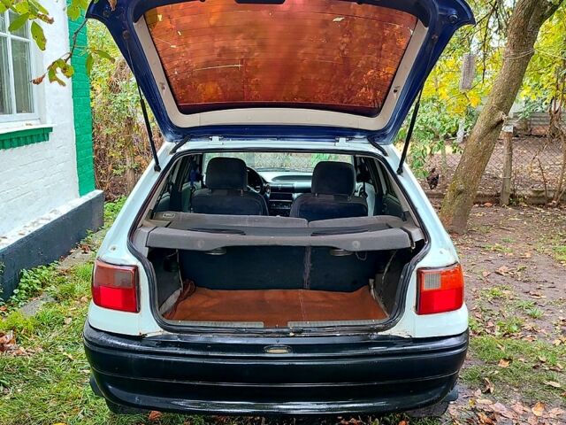 Белый Опель Астра, объемом двигателя 1.4 л и пробегом 312 тыс. км за 1100 $, фото 2 на Automoto.ua