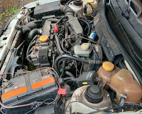 Белый Опель Астра, объемом двигателя 1.4 л и пробегом 312 тыс. км за 1100 $, фото 6 на Automoto.ua