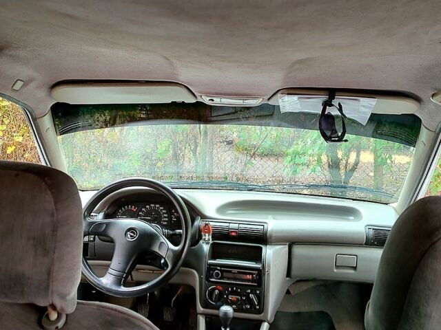 Белый Опель Астра, объемом двигателя 1.4 л и пробегом 312 тыс. км за 1100 $, фото 4 на Automoto.ua