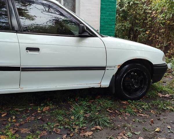 Белый Опель Астра, объемом двигателя 1.4 л и пробегом 312 тыс. км за 1100 $, фото 31 на Automoto.ua