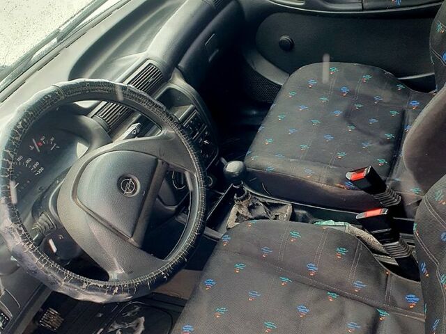 Білий Опель Астра, об'ємом двигуна 1.4 л та пробігом 320 тис. км за 1499 $, фото 8 на Automoto.ua