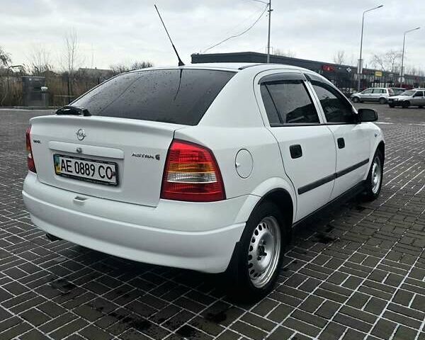 Белый Опель Астра, объемом двигателя 1.2 л и пробегом 263 тыс. км за 2999 $, фото 8 на Automoto.ua