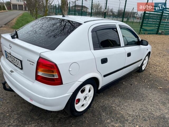 Білий Опель Астра, об'ємом двигуна 2 л та пробігом 239 тис. км за 3499 $, фото 14 на Automoto.ua