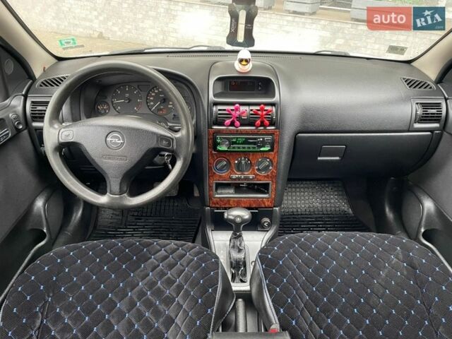 Білий Опель Астра, об'ємом двигуна 2 л та пробігом 239 тис. км за 3499 $, фото 23 на Automoto.ua