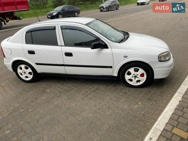 Білий Опель Астра, об'ємом двигуна 2 л та пробігом 239 тис. км за 3499 $, фото 8 на Automoto.ua