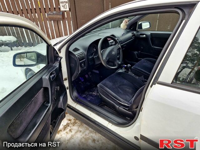 Білий Опель Астра, об'ємом двигуна 1.4 л та пробігом 370 тис. км за 2400 $, фото 5 на Automoto.ua