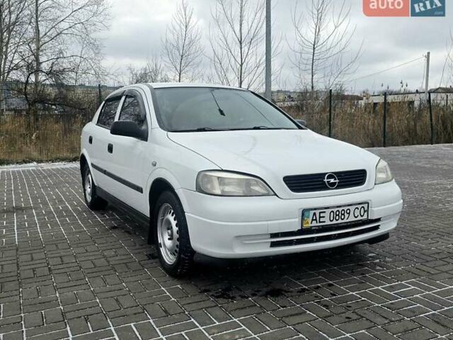 Белый Опель Астра, объемом двигателя 1.2 л и пробегом 263 тыс. км за 2999 $, фото 1 на Automoto.ua