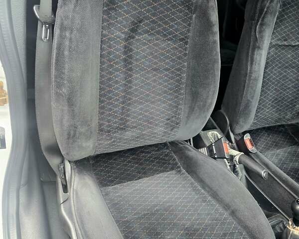 Белый Опель Астра, объемом двигателя 1.2 л и пробегом 263 тыс. км за 2999 $, фото 11 на Automoto.ua