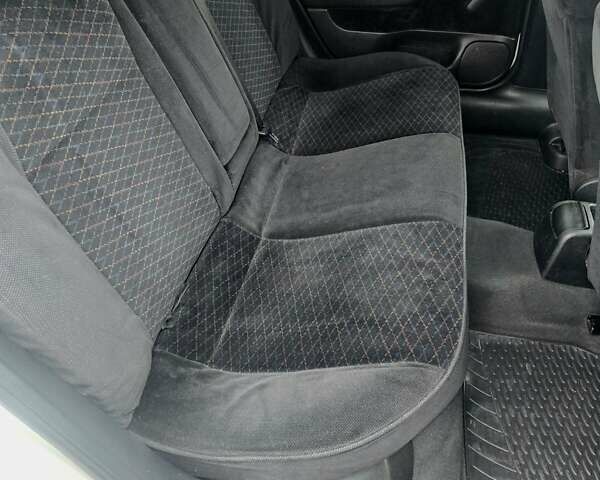 Белый Опель Астра, объемом двигателя 1.2 л и пробегом 263 тыс. км за 2999 $, фото 12 на Automoto.ua