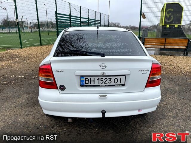 Белый Опель Астра, объемом двигателя 2 л и пробегом 239 тыс. км за 3499 $, фото 1 на Automoto.ua