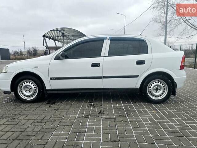 Белый Опель Астра, объемом двигателя 1.2 л и пробегом 263 тыс. км за 2999 $, фото 5 на Automoto.ua