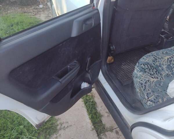 Белый Опель Астра, объемом двигателя 1.2 л и пробегом 400 тыс. км за 3300 $, фото 5 на Automoto.ua