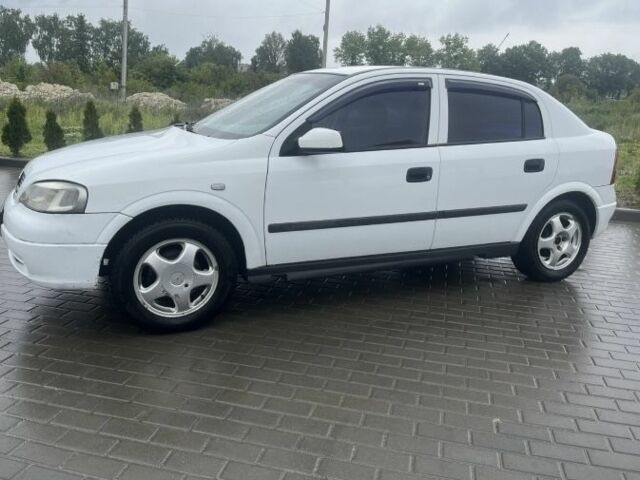 Белый Опель Астра, объемом двигателя 1.6 л и пробегом 285 тыс. км за 2200 $, фото 2 на Automoto.ua