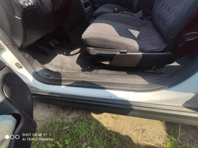 Білий Опель Астра, об'ємом двигуна 1.4 л та пробігом 230 тис. км за 2900 $, фото 11 на Automoto.ua