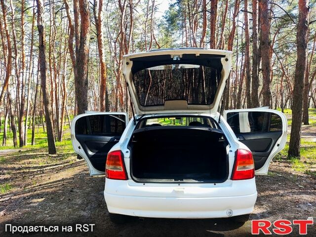 Белый Опель Астра, объемом двигателя 1.4 л и пробегом 274 тыс. км за 3100 $, фото 5 на Automoto.ua