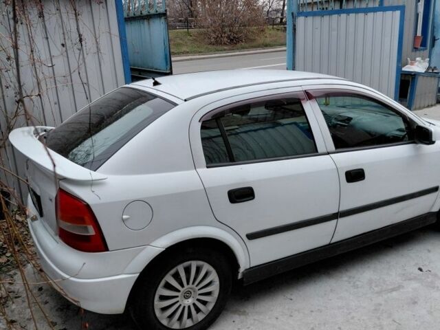 Белый Опель Астра, объемом двигателя 1.4 л и пробегом 260 тыс. км за 2200 $, фото 6 на Automoto.ua