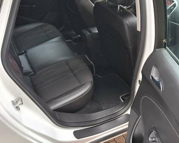 Білий Опель Астра, об'ємом двигуна 1.36 л та пробігом 107 тис. км за 8700 $, фото 2 на Automoto.ua