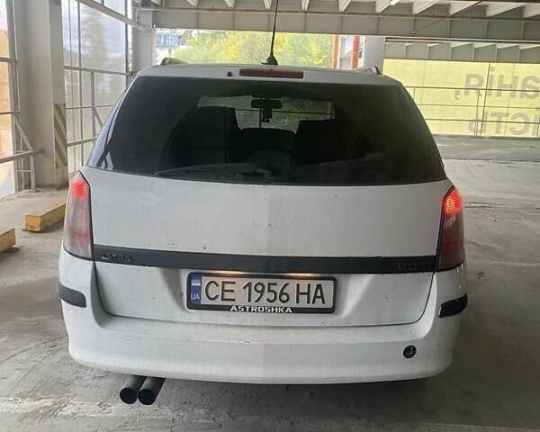 Белый Опель Астра, объемом двигателя 1.7 л и пробегом 330 тыс. км за 3850 $, фото 1 на Automoto.ua