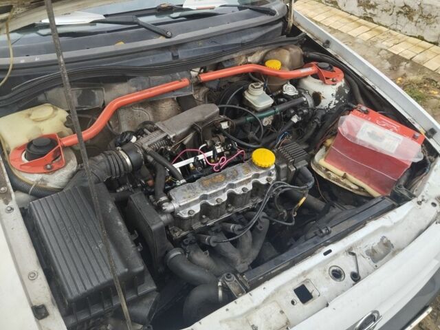 Белый Опель Астра, объемом двигателя 1.4 л и пробегом 250 тыс. км за 1400 $, фото 6 на Automoto.ua