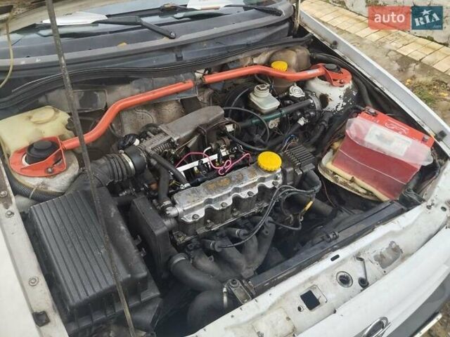 Белый Опель Астра, объемом двигателя 1.4 л и пробегом 250 тыс. км за 1400 $, фото 5 на Automoto.ua