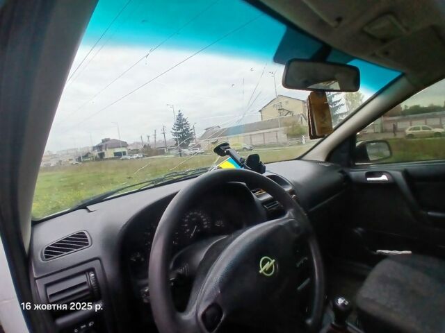 Білий Опель Астра, об'ємом двигуна 1.8 л та пробігом 301 тис. км за 950 $, фото 11 на Automoto.ua