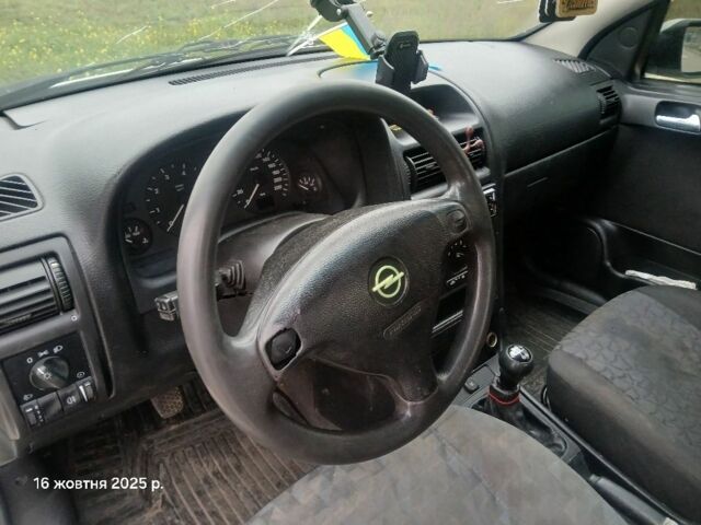 Білий Опель Астра, об'ємом двигуна 1.8 л та пробігом 301 тис. км за 950 $, фото 7 на Automoto.ua