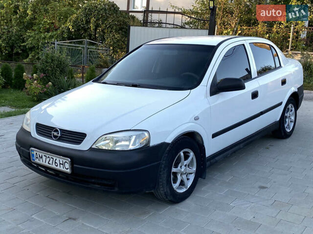 Белый Опель Астра, объемом двигателя 1.39 л и пробегом 300 тыс. км за 2500 $, фото 7 на Automoto.ua