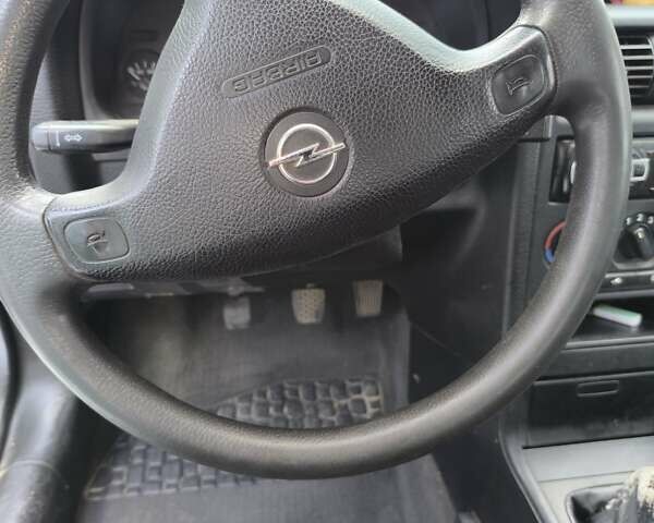 Белый Опель Астра, объемом двигателя 1.6 л и пробегом 226 тыс. км за 2500 $, фото 6 на Automoto.ua