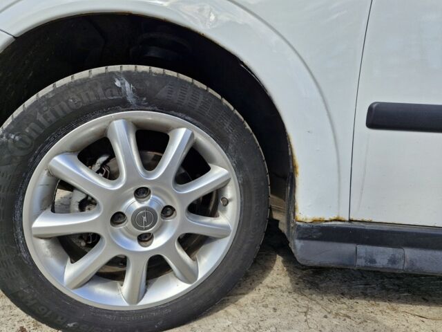 Белый Опель Астра, объемом двигателя 1.4 л и пробегом 400 тыс. км за 2900 $, фото 6 на Automoto.ua