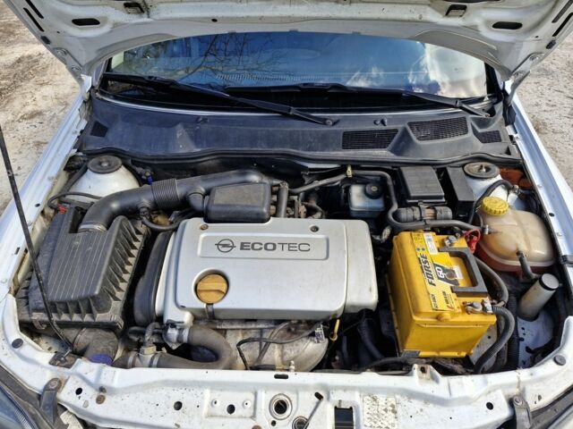 Белый Опель Астра, объемом двигателя 1.4 л и пробегом 400 тыс. км за 2900 $, фото 2 на Automoto.ua