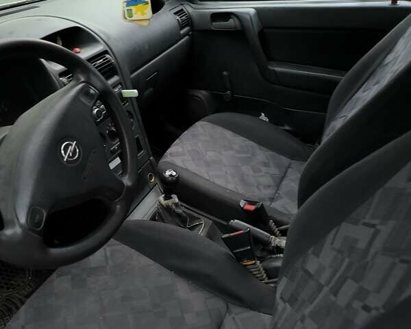 Белый Опель Астра, объемом двигателя 1.6 л и пробегом 226 тыс. км за 2500 $, фото 13 на Automoto.ua