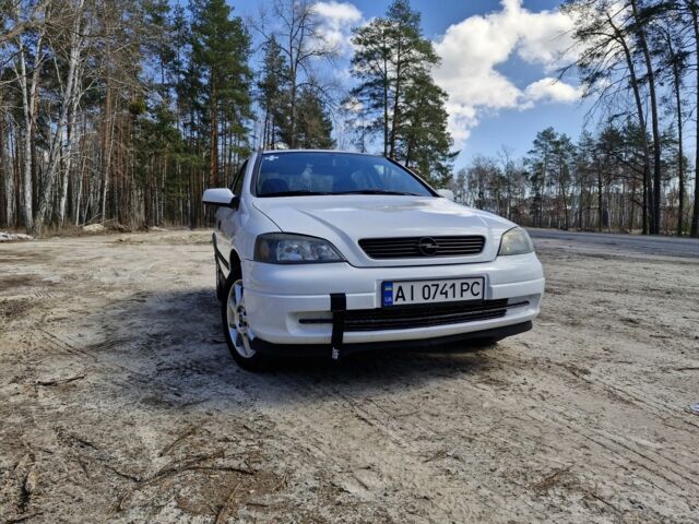 Белый Опель Астра, объемом двигателя 1.4 л и пробегом 400 тыс. км за 2900 $, фото 3 на Automoto.ua