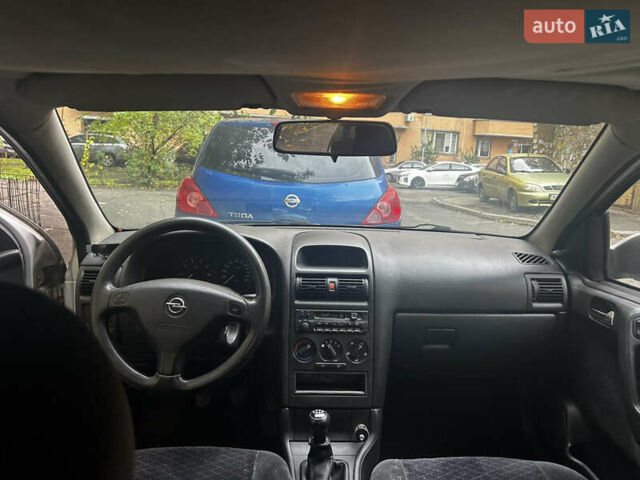 Белый Опель Астра, объемом двигателя 1.4 л и пробегом 285 тыс. км за 2321 $, фото 4 на Automoto.ua