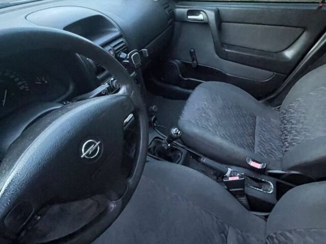 Белый Опель Астра, объемом двигателя 1.6 л и пробегом 300 тыс. км за 2500 $, фото 5 на Automoto.ua