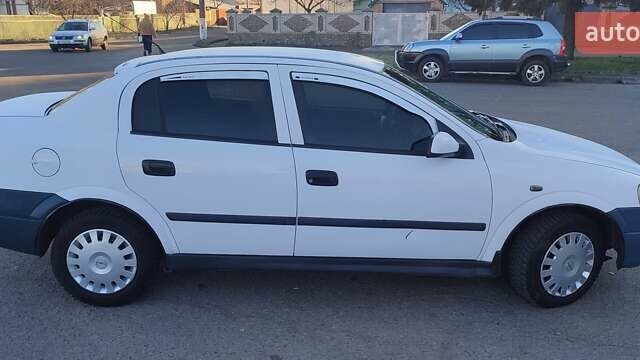 Білий Опель Астра, об'ємом двигуна 1.39 л та пробігом 251 тис. км за 3500 $, фото 4 на Automoto.ua