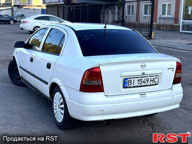 Белый Опель Астра, объемом двигателя 1.6 л и пробегом 250 тыс. км за 2500 $, фото 2 на Automoto.ua