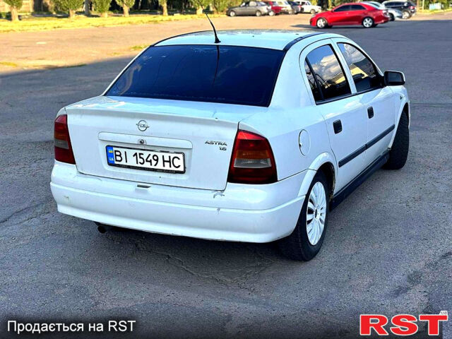 Белый Опель Астра, объемом двигателя 1.6 л и пробегом 250 тыс. км за 2500 $, фото 1 на Automoto.ua