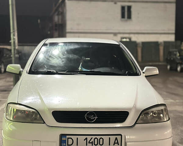 Белый Опель Астра, объемом двигателя 1.39 л и пробегом 340 тыс. км за 3650 $, фото 2 на Automoto.ua