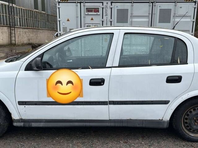 Белый Опель Астра, объемом двигателя 1.4 л и пробегом 304 тыс. км за 3500 $, фото 3 на Automoto.ua