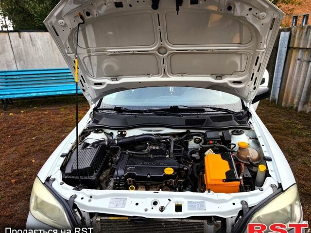 Білий Опель Астра, об'ємом двигуна 1.4 л та пробігом 248 тис. км за 5000 $, фото 2 на Automoto.ua