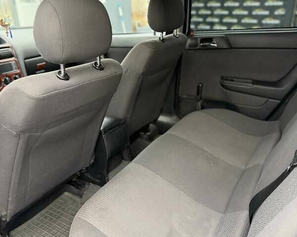 Белый Опель Астра, объемом двигателя 1.4 л и пробегом 221 тыс. км за 1700 $, фото 8 на Automoto.ua