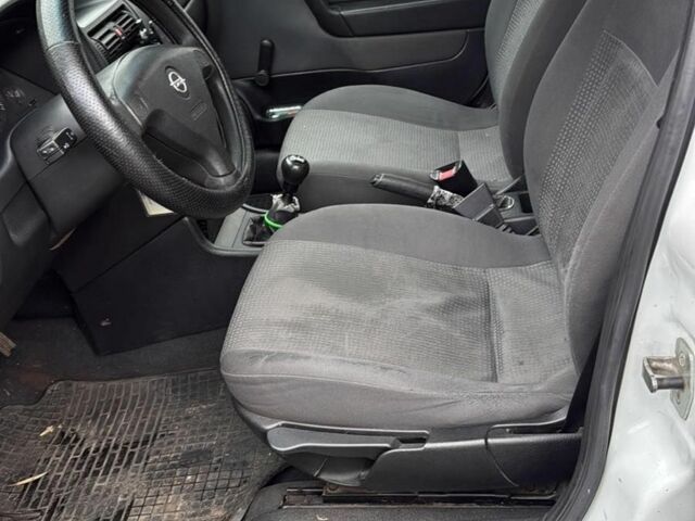 Белый Опель Астра, объемом двигателя 1.4 л и пробегом 304 тыс. км за 3500 $, фото 6 на Automoto.ua