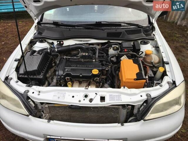 Белый Опель Астра, объемом двигателя 1.4 л и пробегом 248 тыс. км за 5000 $, фото 4 на Automoto.ua