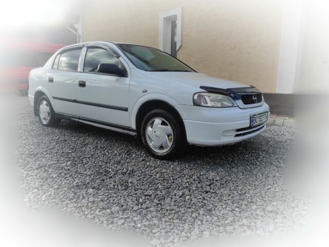 Белый Опель Астра, объемом двигателя 1.4 л и пробегом 216 тыс. км за 3650 $, фото 1 на Automoto.ua