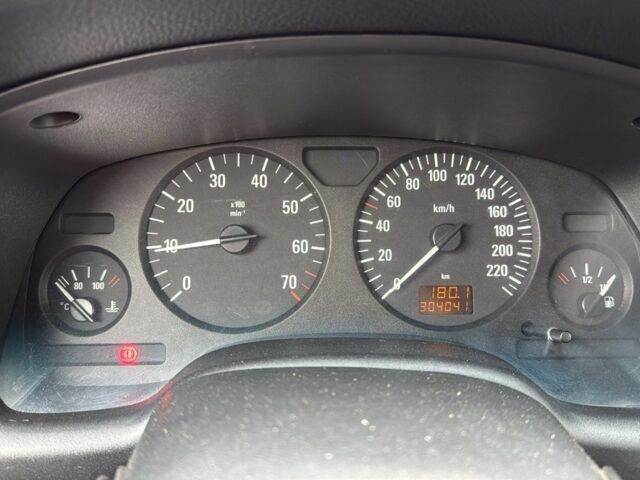 Белый Опель Астра, объемом двигателя 1.4 л и пробегом 304 тыс. км за 3500 $, фото 7 на Automoto.ua